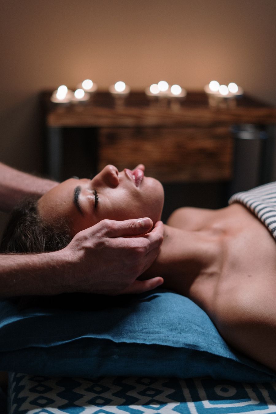 Facial massage by candlelight